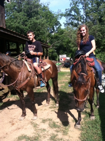 Couple getting ready to ride